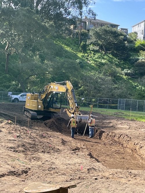 ditch being dug at western end of park