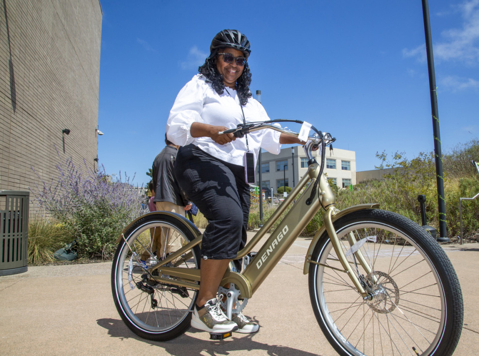Participant tests out an electric bike at the Electrify My Ride event in Sep 2025 at Southeast Community Center
