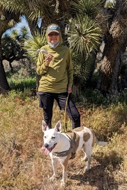 Hiker Alex Stecher and his dog Apollo. Photo courtesy of East Bay Regional Park District.