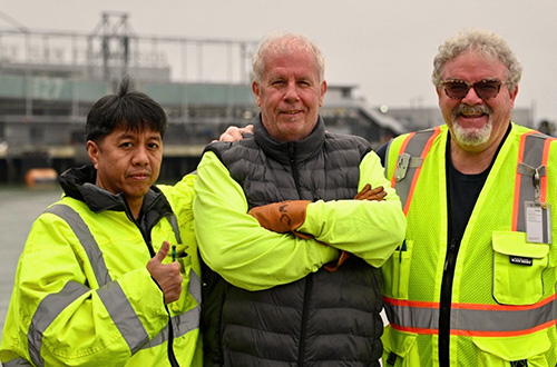 Nestor Nido, with his colleagues, helps keep the lights on in San Francisco. 