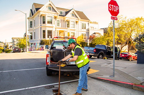 Bob Olinger monitors pressure and volume of water flow and operate gate valves in the streets that regulate San Francisco's water supplies.