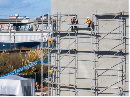 Workers building the new digesters