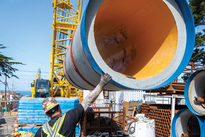 Large water pipe on a flatbed truck