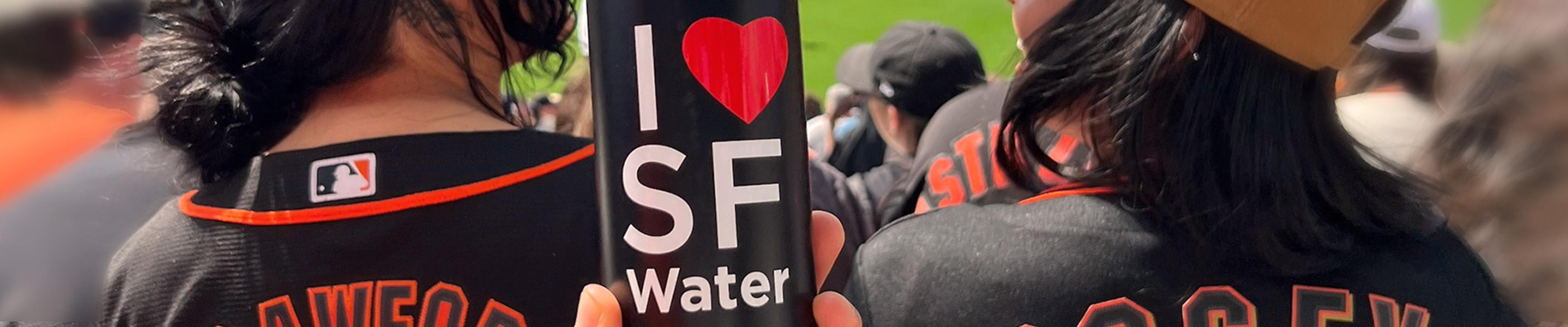 SFPUC water bottle  with "I heart SF Water" written on it featured at a sporting game.