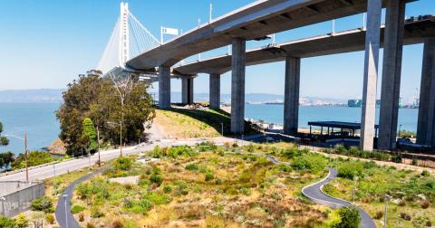 Redevelopment areas, like Treasure Island near the Golden Gate Bridge, require open space, an opportunity to plan centralized green infrastructure.