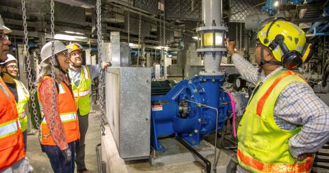 Jignesh Desai, Headworks Project Manager, highlighted the grit pump gallery in Area 45, during a recent tour with SFPUC Commission President Kate Stacy. The clear view window shows the grit particles that are being pumped to next step of grit washing process.