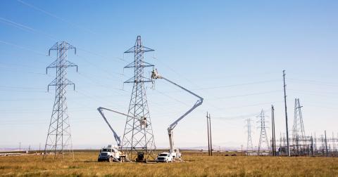 SFPUC crew members working on transmission lines. 