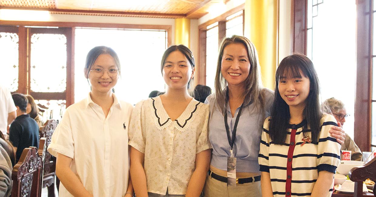 Megan (light blue shirt) and three young women who are part of COV's Bright Scholars program and attending college.