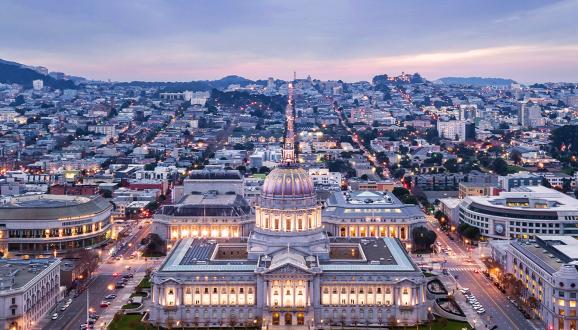 San Francisco City Hall and surrounding area at nighttime. 