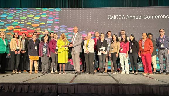 The CleanPowerSF team accepting the Community Impact Award at the California Community Choice Association's annual conference.