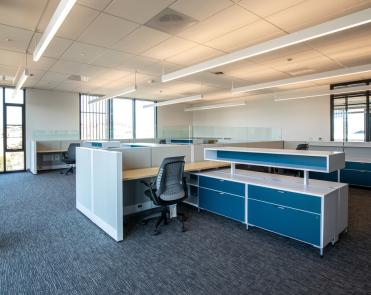 Suite 301-D workstation in open office area